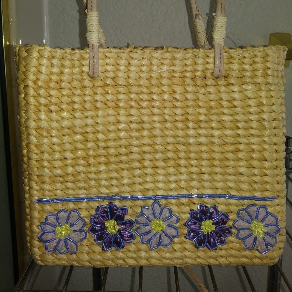 Girls rattan purse new without tags. Genuine leath